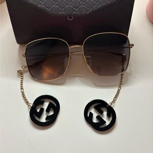 Gucci Sunglasses with Gold Frame and Black Accents